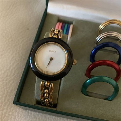 gucci watch women interchangeable|Gucci watch changeable bezels.